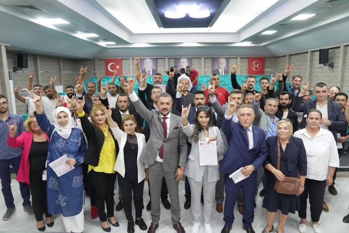 Ayhan Türk ve beraberindeki eski Zafer Partililer MHP'ye katıldı